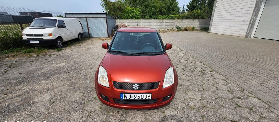 Suzuki Swift cena 12900 przebieg: 156230, rok produkcji 2009 z Warszawa małe 67